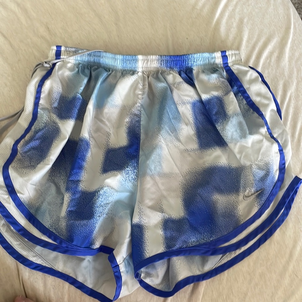 Grey and blue Nike running shorts